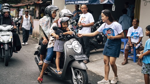 Relawan Paslon 02 APPIK, menyemarakkan kegiatan bertema Aksi Muda on The Road Bersama Indonesia Maju di kawasan JNM. Foto: Ist