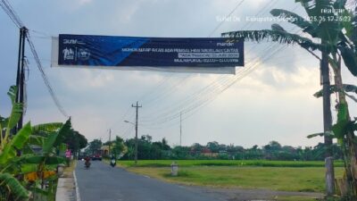 Spanduk permohinan maaf panitia MJM yang akan menggunakan jalan untuk event. Foto: Ist